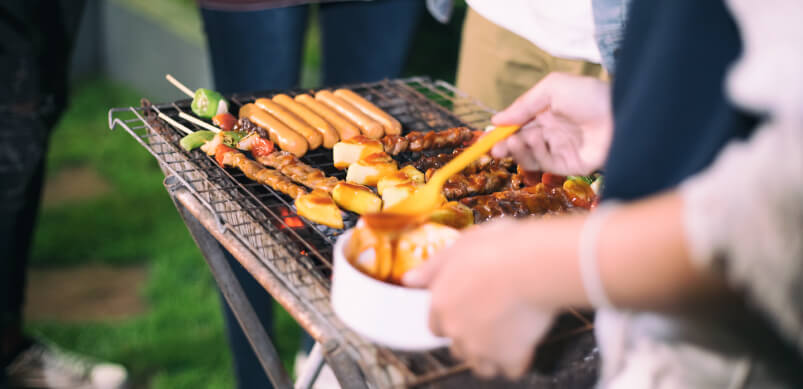 Spreading Sauce On Barbecue Meat