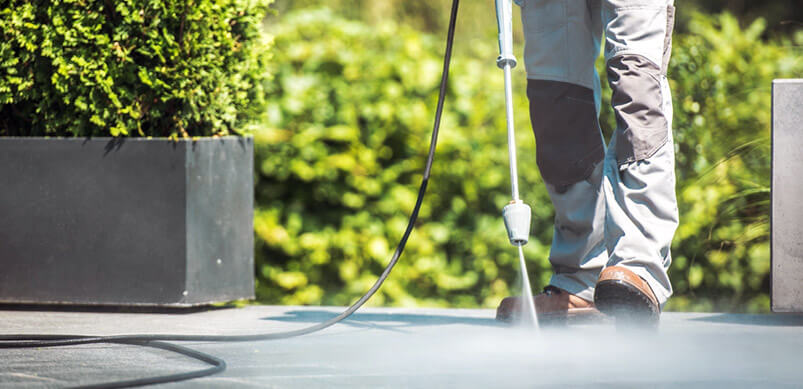 Pressure Washer Cleaning Patio